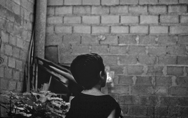 Child in an alley