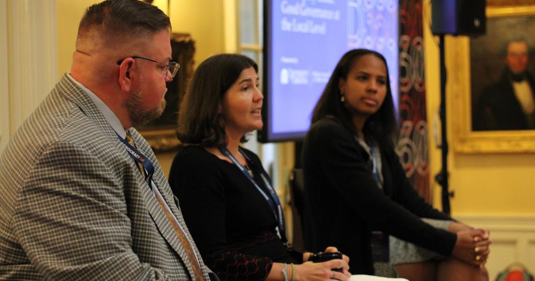 a panel of speakers at a weldon cooper event