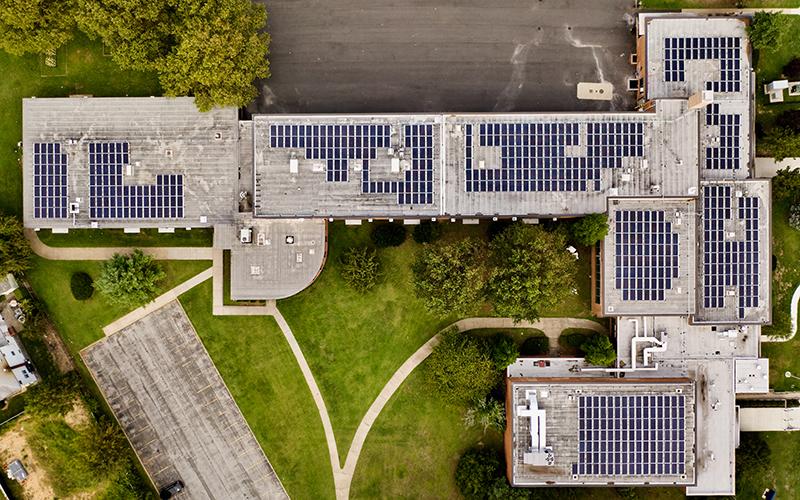 buildings with solar panels mounted on roofs